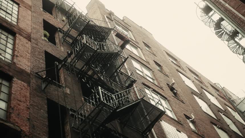 Fire escapes outside apartment buildings in the city