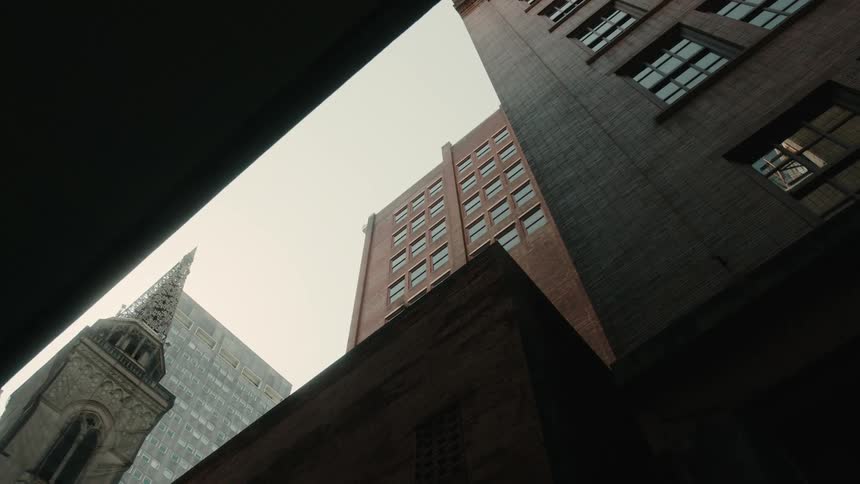 Upward view of large buildings in a metropolis