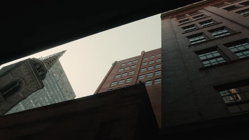 Upward view of buildings and skyscrapers in a metropolis