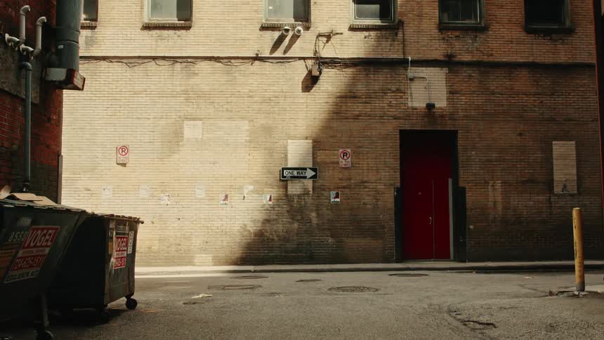 Narrow alley between urban buildings