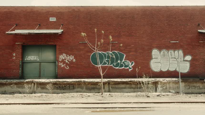 Brick wall with graffiti