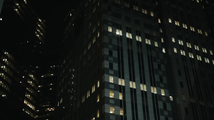 Skyscrapers in a metropolis illuminated at night
