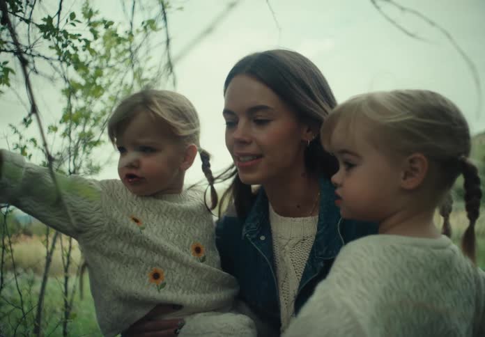 A mother and her daughters enjoy a day out in nature