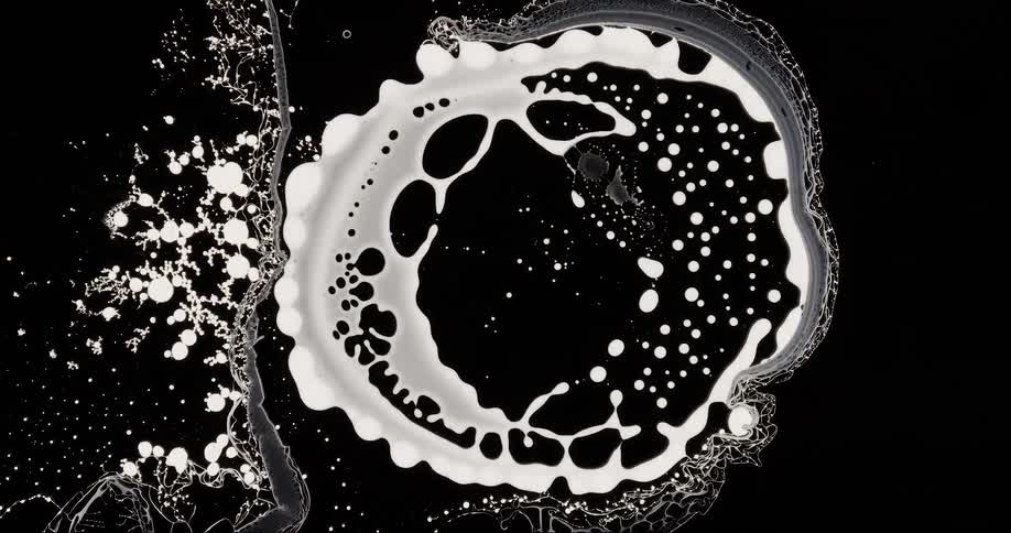 Abstract composition of a liquid succumbing and forming droplets