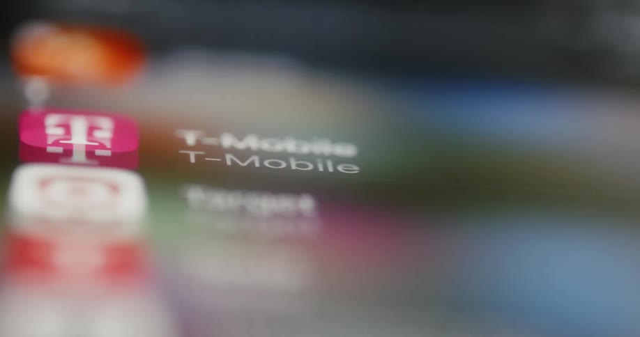 Extreme closeup of a finger scrolling across an iphone screen