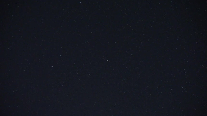 The stars shine brightly in a night sky