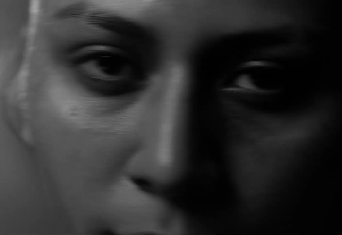 A woman is sweating as she exercises