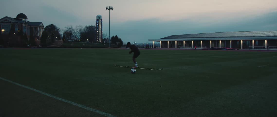 A man runs on the soccer field
