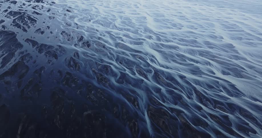 A massive body of water frozen with ice