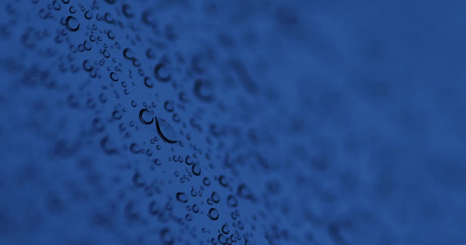 Partially blurry close up of condensation on a surface