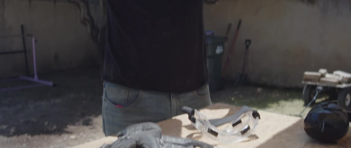 Man putting on a protective mask