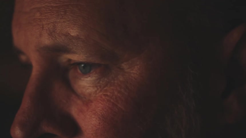 Side portrait of a man with blue eyes