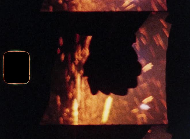 Romantic close up of a couple or a teenage boy and girl falling in love while watching fireworks grabbing their hands and holding hands for the first time creating suspense as the romance begins