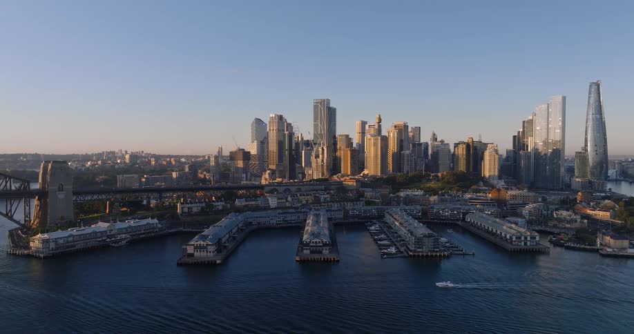 Aerial view of the piers and skyline of sydney at sunrise