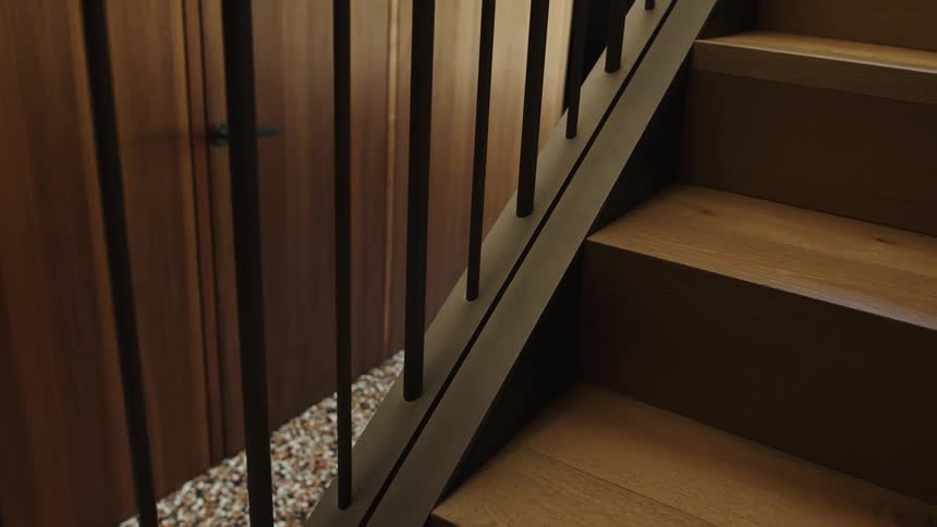 Interior design of a wooden staircase in a house