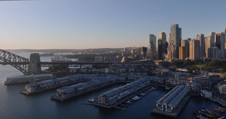 Aerial view of the piers and skyline of sydney at sunrise