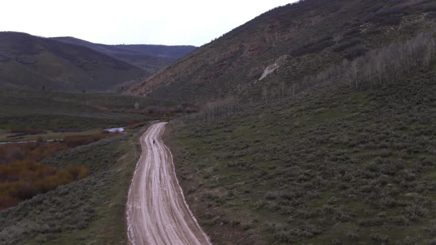 A dirt road in a valley