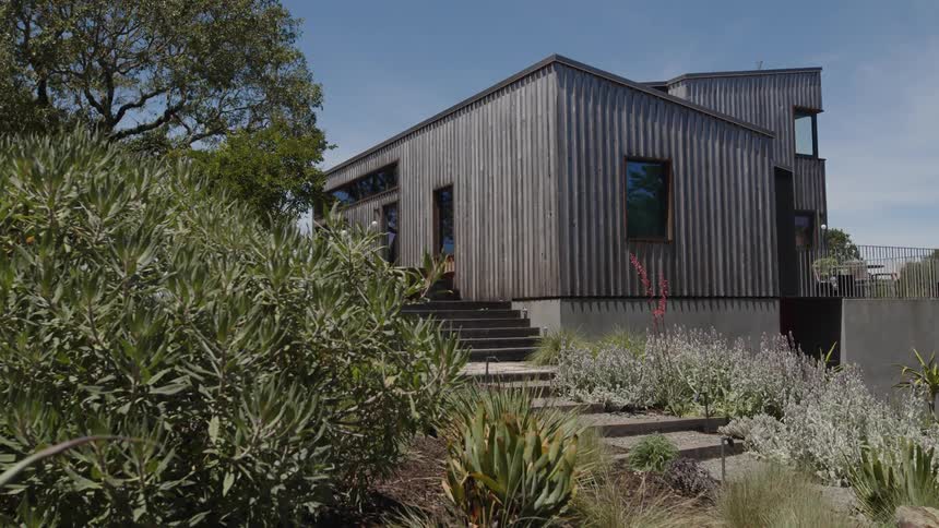 External staircases leading to a modern house