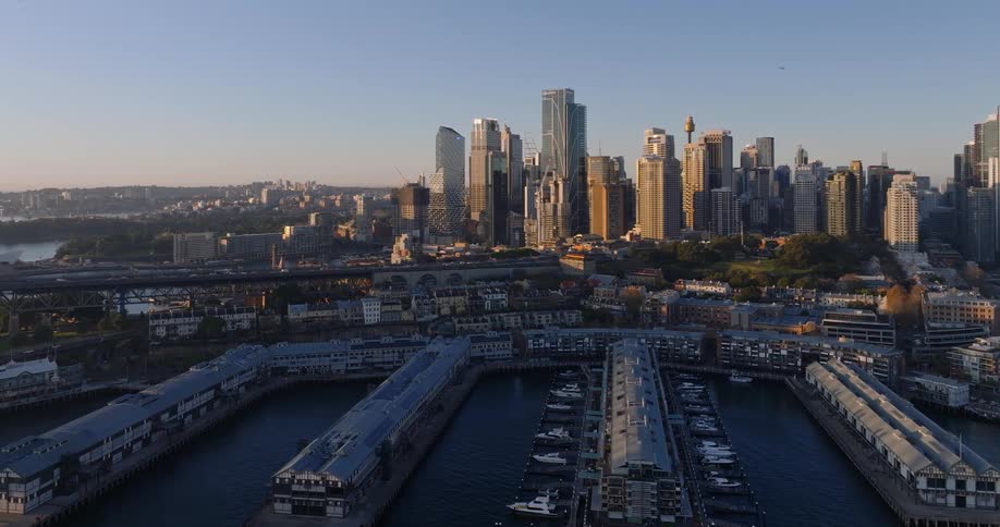 Aerial view of the piers and skyline of sydney at sunrise