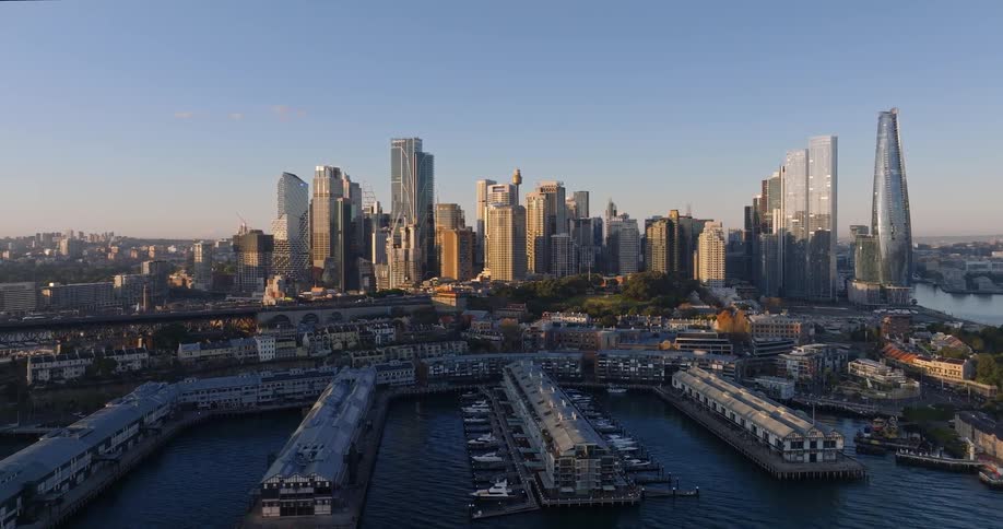 Aerial view of the piers and skyline of sydney at sunrise