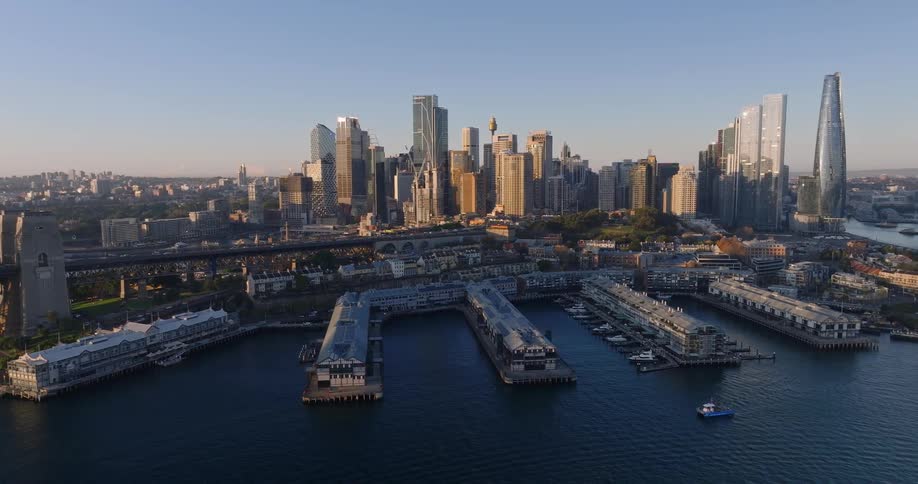 Aerial view of the piers and skyline of sydney at sunrise
