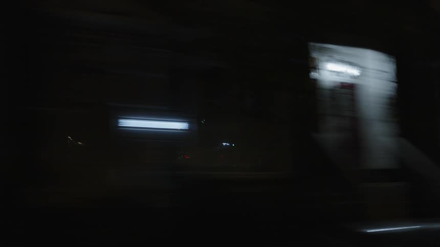 Choppy footage of night lights in the city