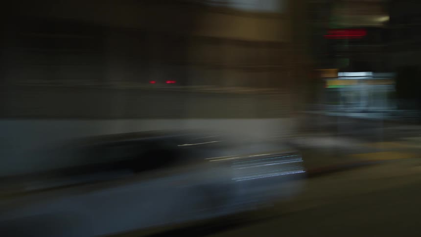 Moving view of a city streets at night