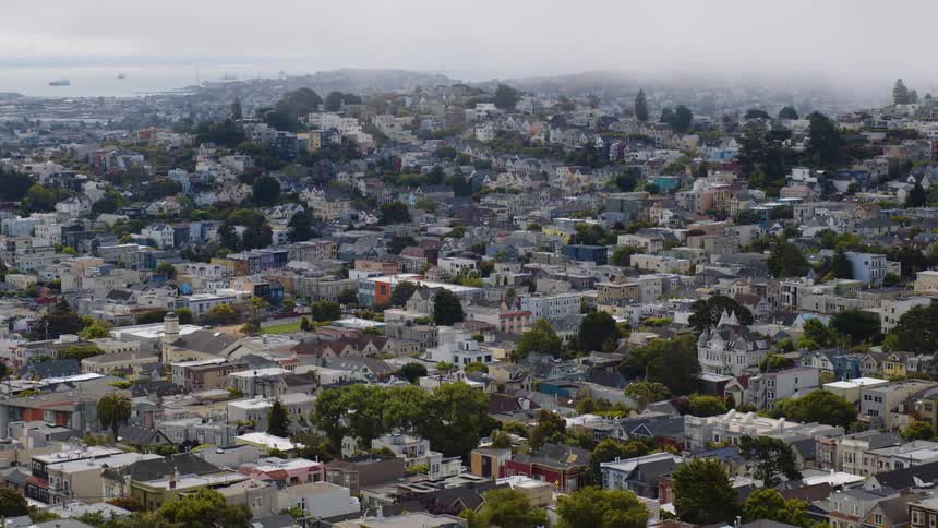 Aerial view of a city with several houses and buildings