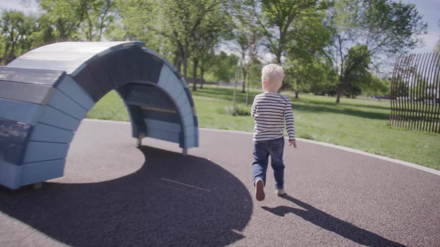 A child is running on in the playground
