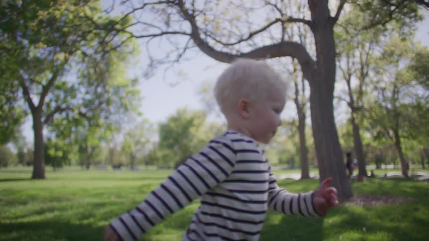 A child is running in the park
