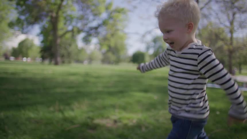 A child is running in the park