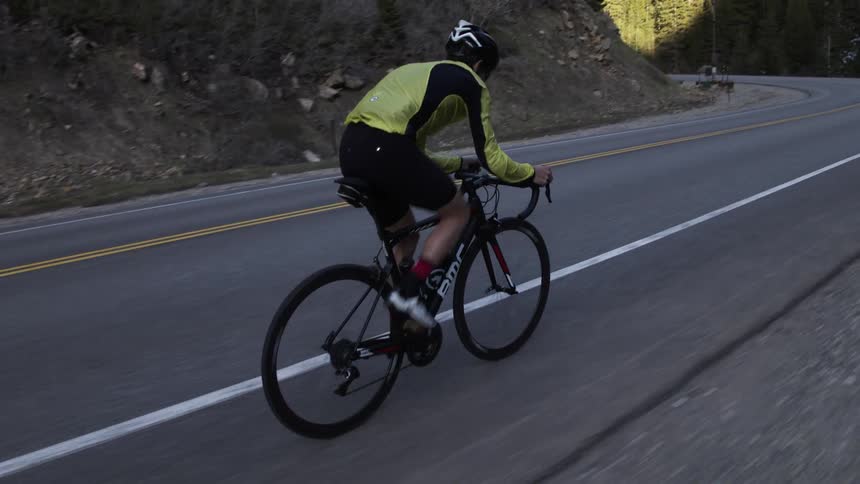 Man riding a bicycle on a highway