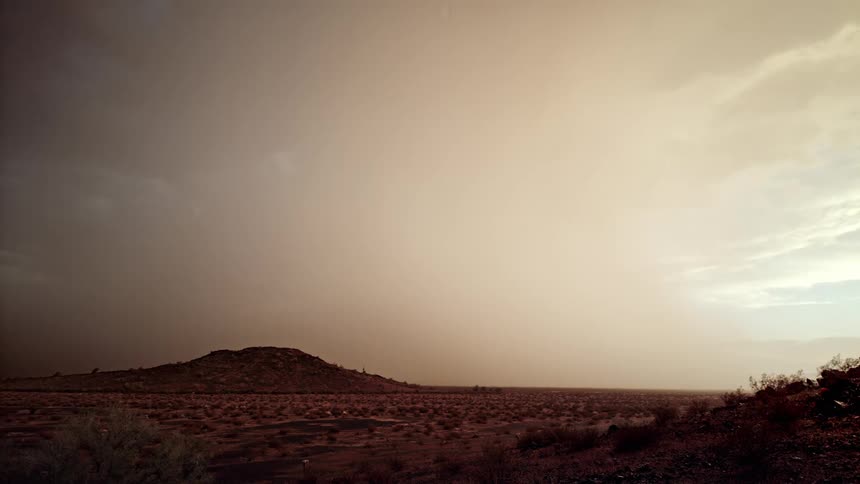 Natural landscape with mountains and a sky with thunder and rain