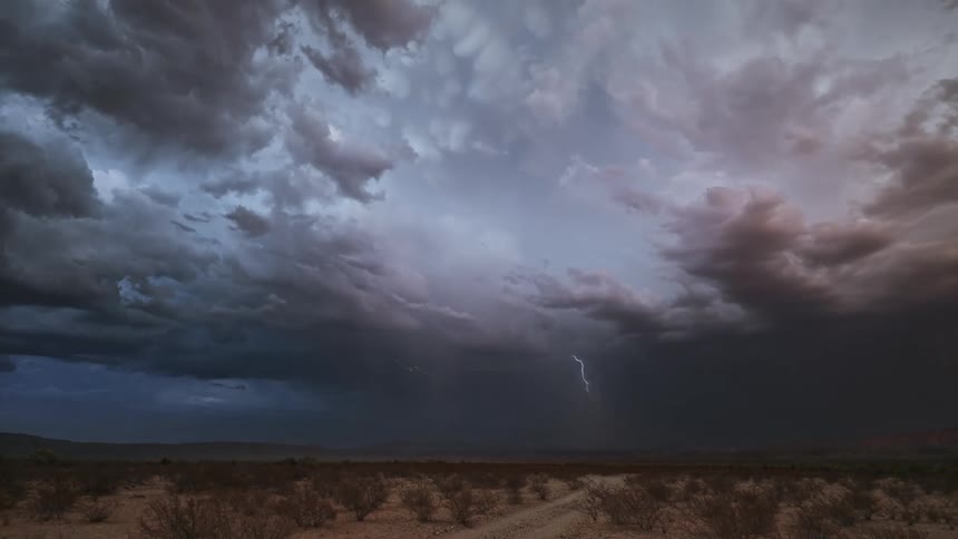 Natural field on a day with storm and lightning