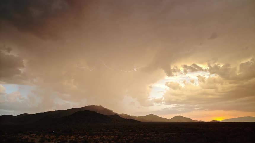 Lightning shoots through the clouds of a storm