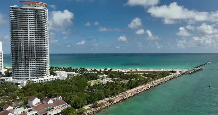 An aerial view of a vibrant coastal city in florida the coast stretches toward the horizon