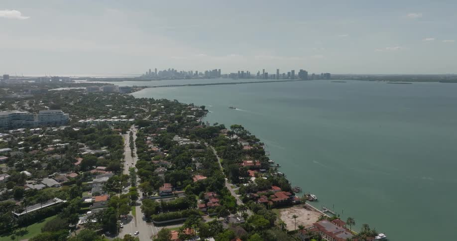 An aerial view of a vibrant coastal city in florida the coast stretches toward the horizon