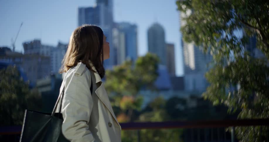 A woman is walking in the city