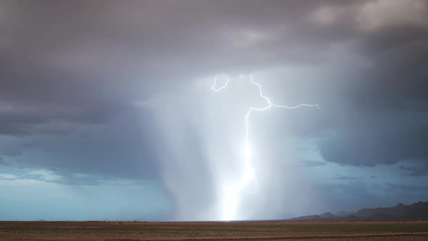 Landscape of a field on a day with rain and thunder