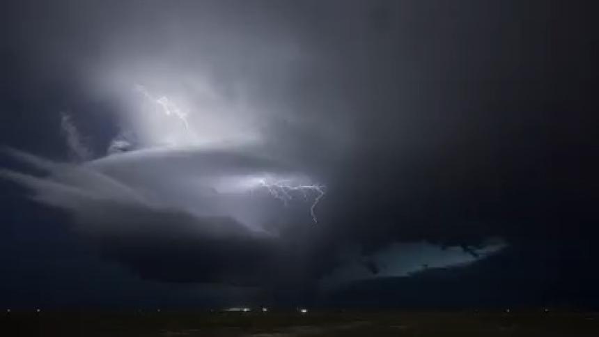 Lightning and thunder in a stormy night sky