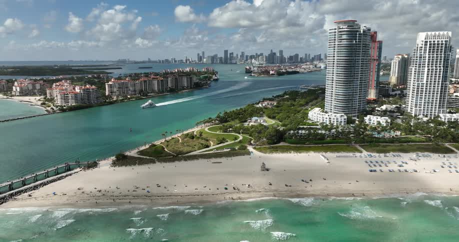 Aerial panorama of buildings in a metropolis with resorts and apartments on the edge of a crystalclear beach