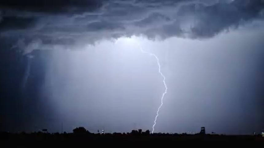Lightning strikes the city at night