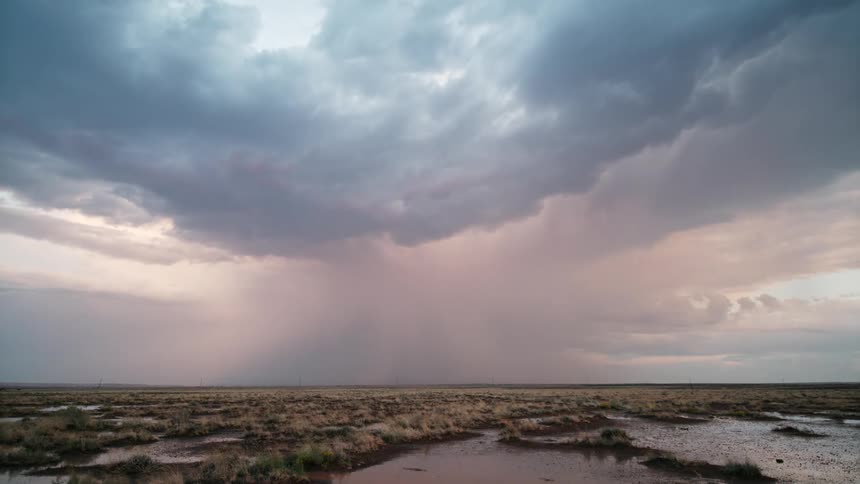 Numerous bolts of lightning flash in the sky as storm clouds hover overhead