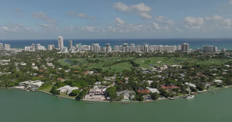 Aerial scene of an island with seaside buildings and resorts
