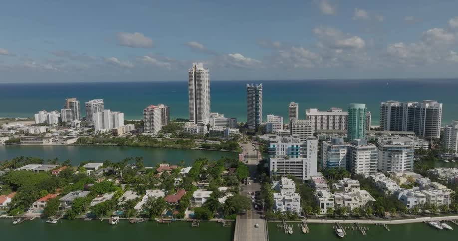 An aerial view of a vibrant coastal city in florida the coast stretches toward the horizon