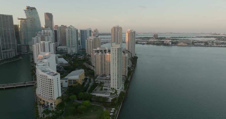 Aerial panorama of skyscrapers surrounded by the sea