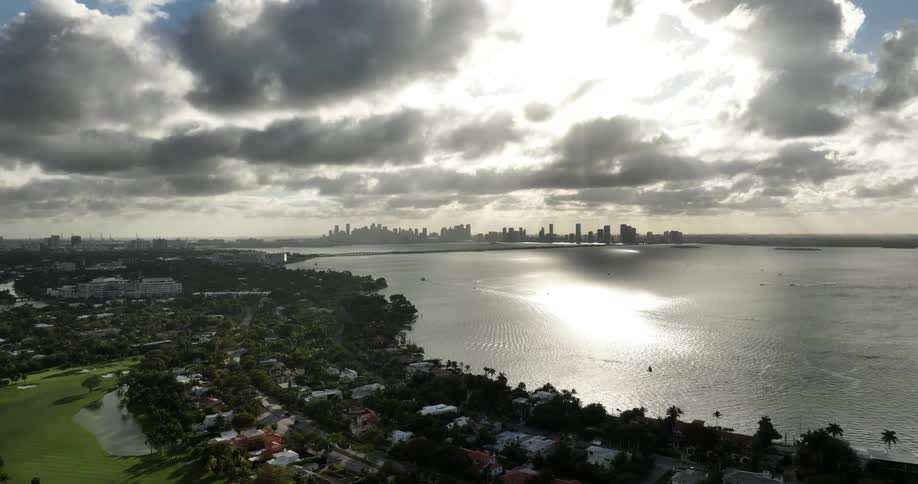 An aerial view of a vibrant coastal city in florida the coast stretches toward the horizon