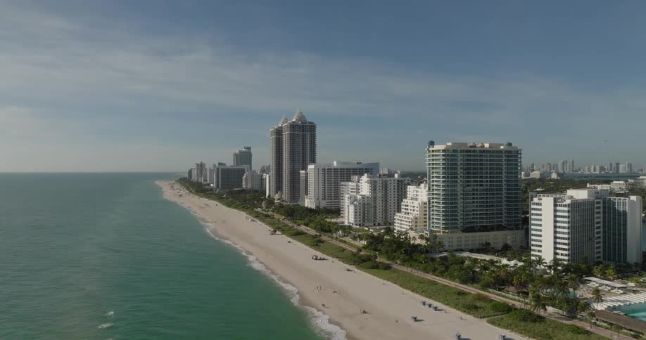 Tall buildings are right near the beach