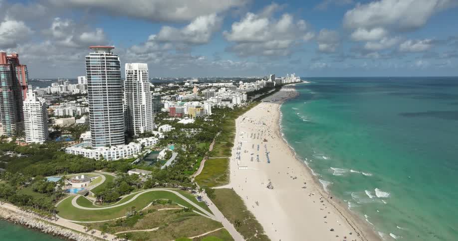 Bluegreen ocean waves reach the South Beach Miami