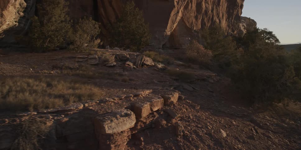 The canyon is covered with bushes rocks at dawn